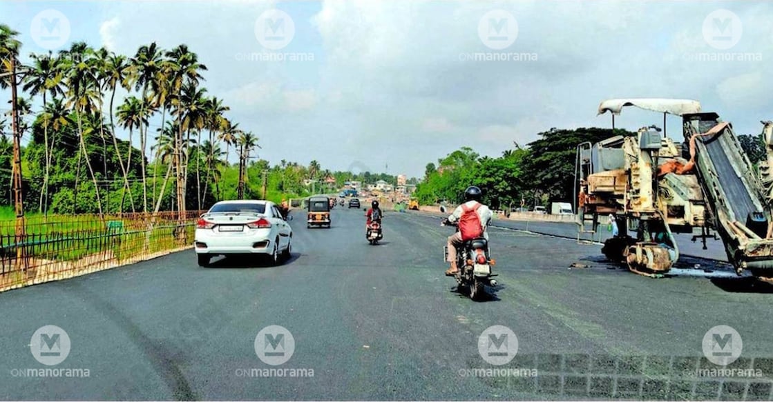 Road surfacing work underway in its final phase on the National Highway, including the new Ithikkara bridge. Photo: Special arrangement
