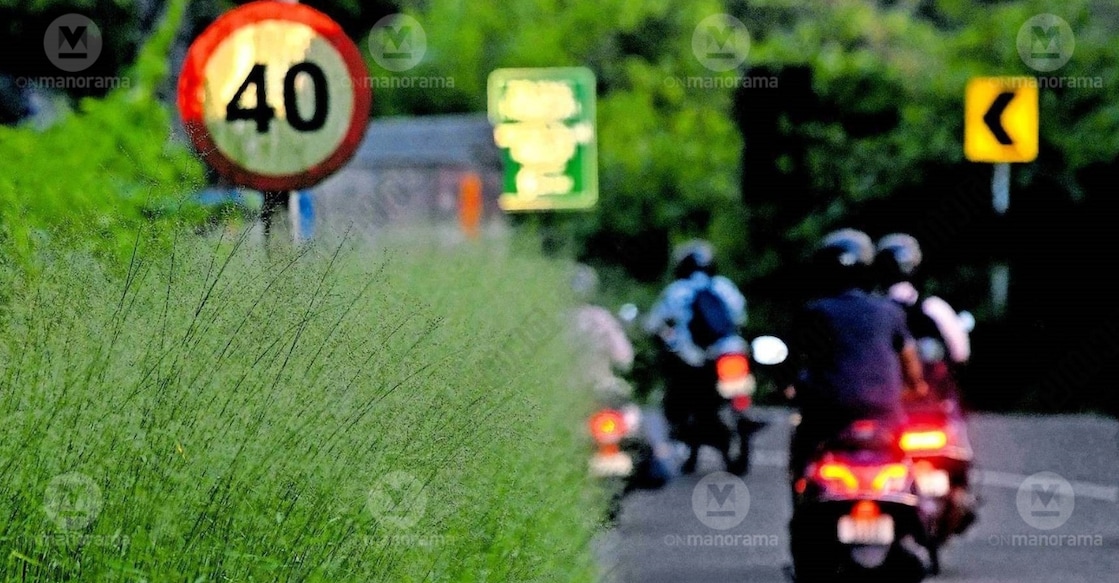 Dense overgrowth encroaching onto the road near the SNDP branch in Manganam. Photo: Special Arrangement.