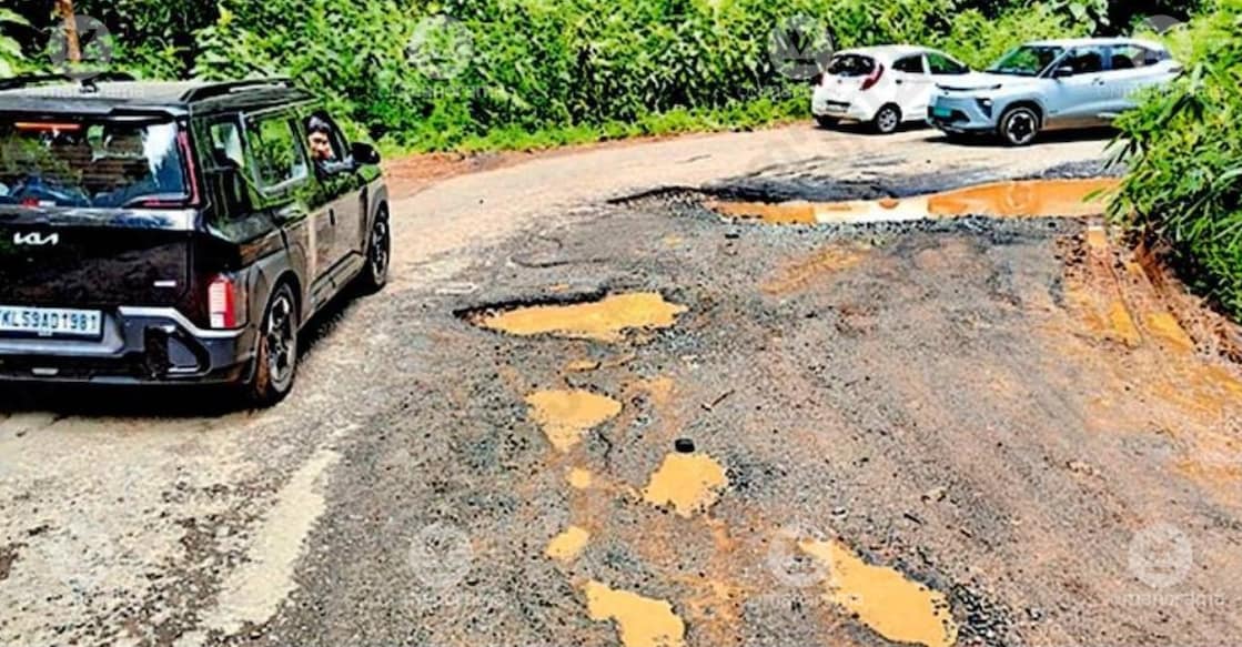 Potholes along the Makkoottam Ghat road. photo: Special arrangement 