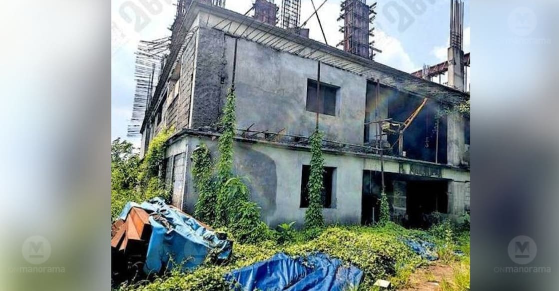 Work on the Devaswom Board’s Sabarimala pilgrim transit center in Chengannur has ground to a halt, with construction materials left behind gathering rust. photo: Special arrangement