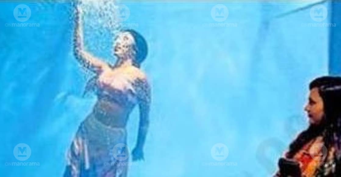 Visitors viewing the mermaid exhibit at the Chengannur Fest grounds. Photo: Special Arrangement.