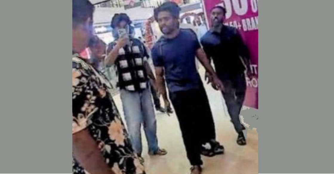 A screengrab showing the verbal altercation between the SFI activists and the police officer (L). Photo: Manorama Online