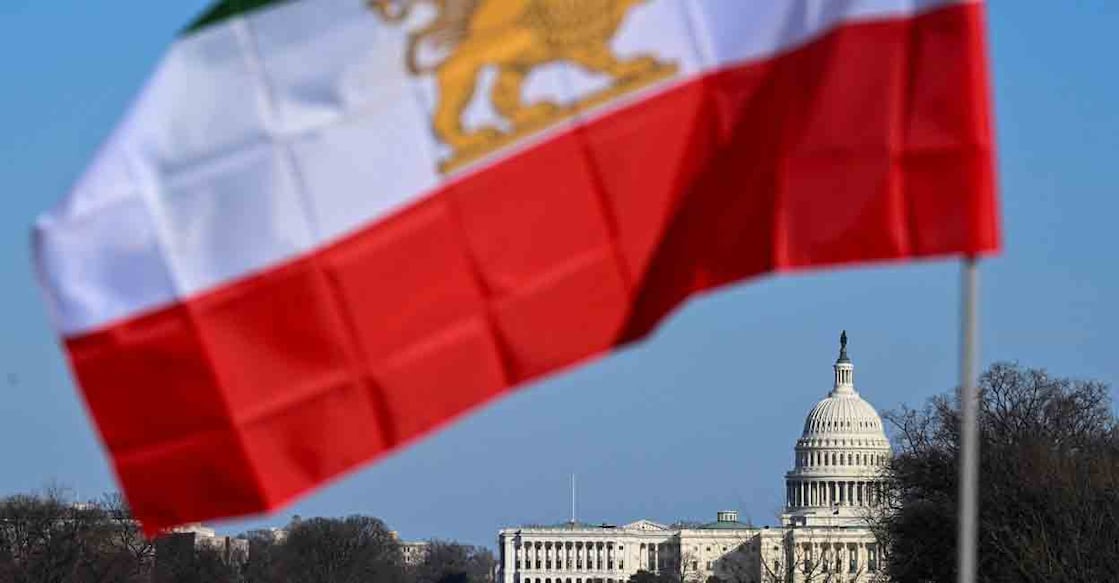 The Iranian pre-Islamic revolution of 1979 flag is seen near the US Capitol during a march in support of the people of Iran by members of the American-Iranian community in Washington, DC, on February 14, 2026. Photo: ROBERTO SCHMIDT / AFP