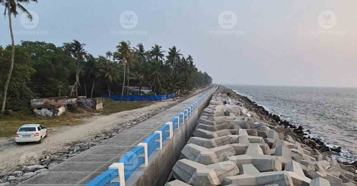Coastal residents face anxiety as the second phase of a seawall project stalls due to administrative delays post-election code, leaving them.Chellanam coastal protection, tetrapod seawall project, monsoon sea erosion, Kerala coastal defence, Kannamaly residents, Pinarayi Vijayan inauguration, coastal hamlet anxiety, Phase II project delay, Kochi sea defence, election code of conduct impact, residents fear monsoon, coastal protection measures, Kerala High Court petition, seawall project stalled, coastal community concerns