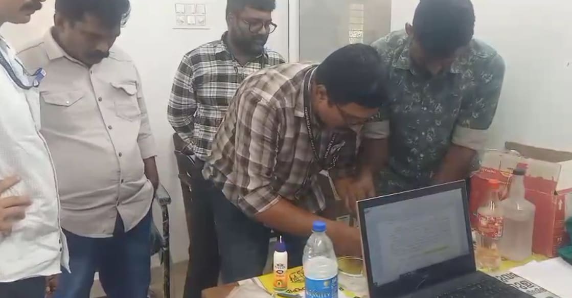 A screengrab showing Vigilance officials inspecting Vinod's office. Photo: Special arrangement