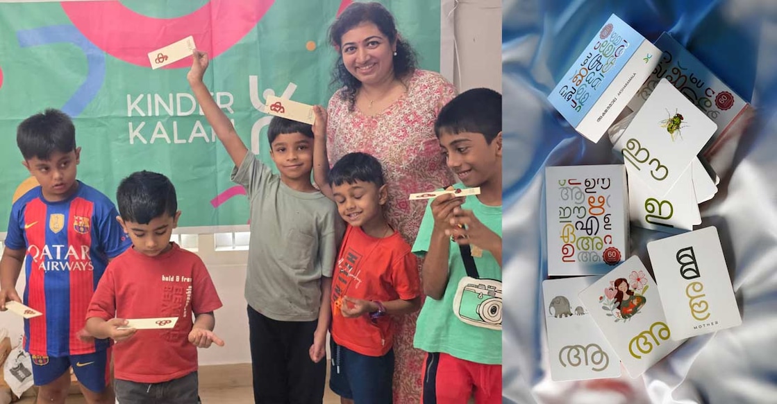 Anila Mathew children holding flashcards of letters. Photo: Special arrangement