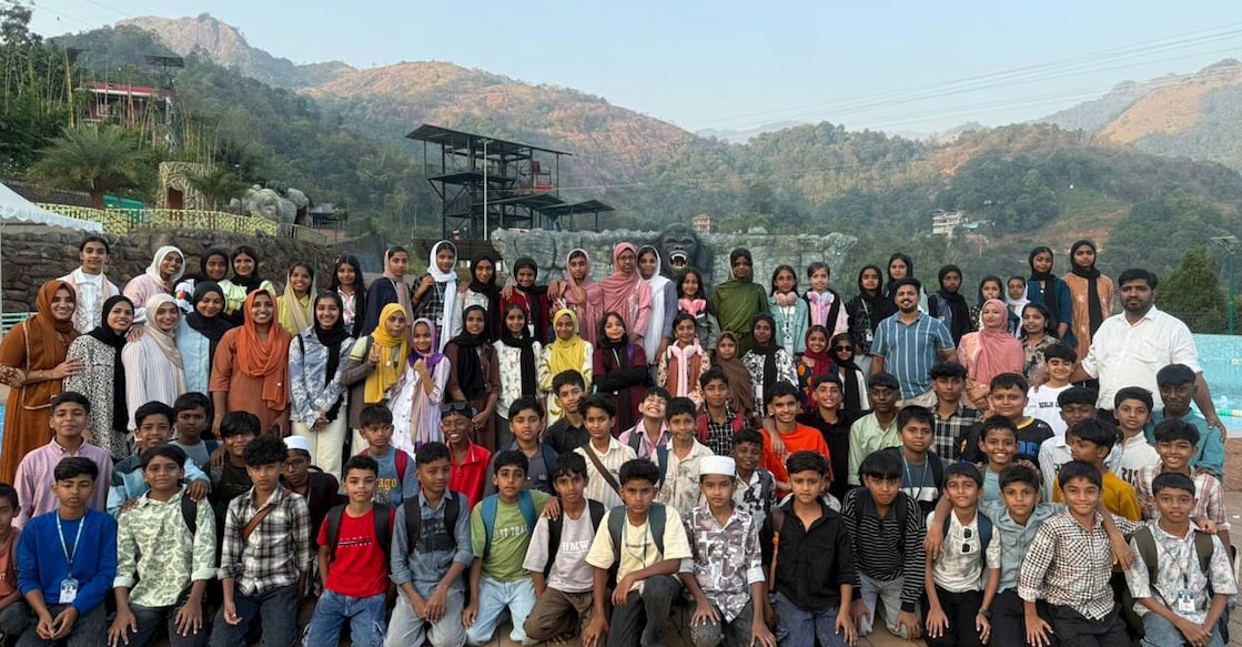 Urdu teacher PC Shereef (extreme right) with his students from Manadevan UP School in Trikkalangode. Photo: Special Arrangement