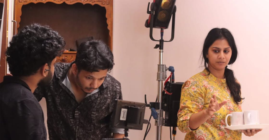 Director Amal Sreekovil, actor Poombatta, in between takes while filming 'Meanwile She'. Photo: Special Arrangement