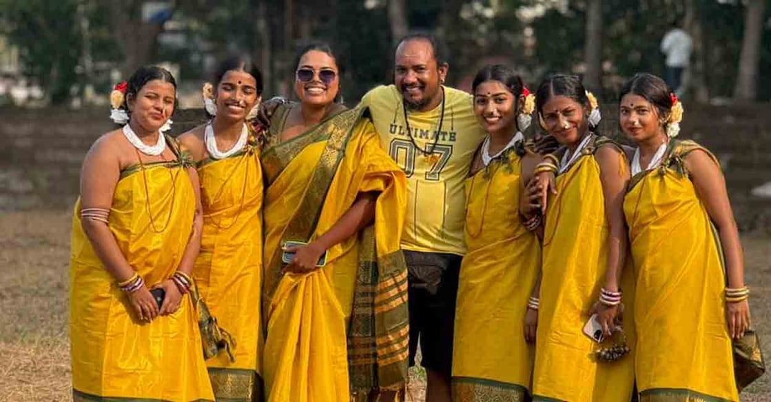 Maharaja's College folk song team with their trainer Anjana Raveendran. Photo: Special arrangement