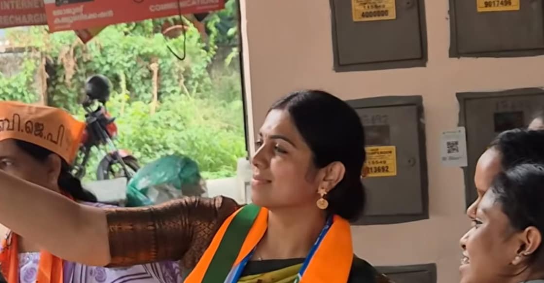 Anjali Nair taking a selfie during the campaign in Udayamperoor. Photo: Onmanorama