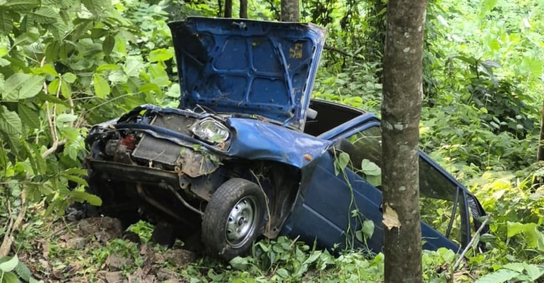The car, which plunged nearly 400 feet into a gorge near Amalagiri in Peruvanthanam. Photo: Special Arrangement