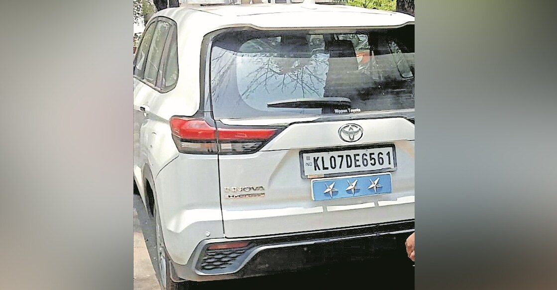 The three-star insignia displayed on Thachankary's car. Photo: Manorama
