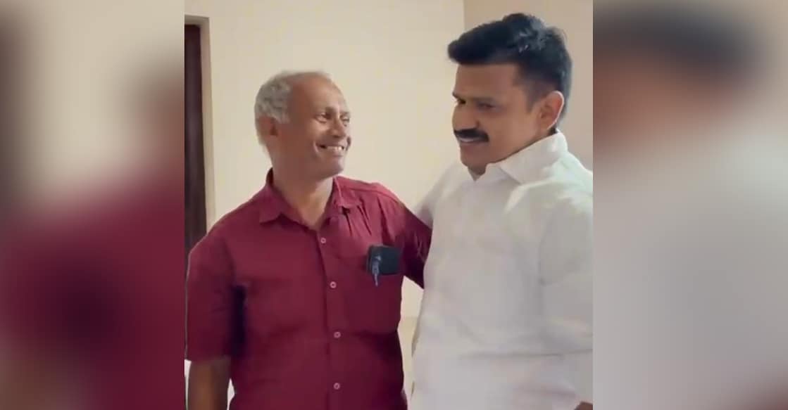 CPM worker Krishnan meeting UDF candidate Sandeep Varier. Photo: Special Arrangement