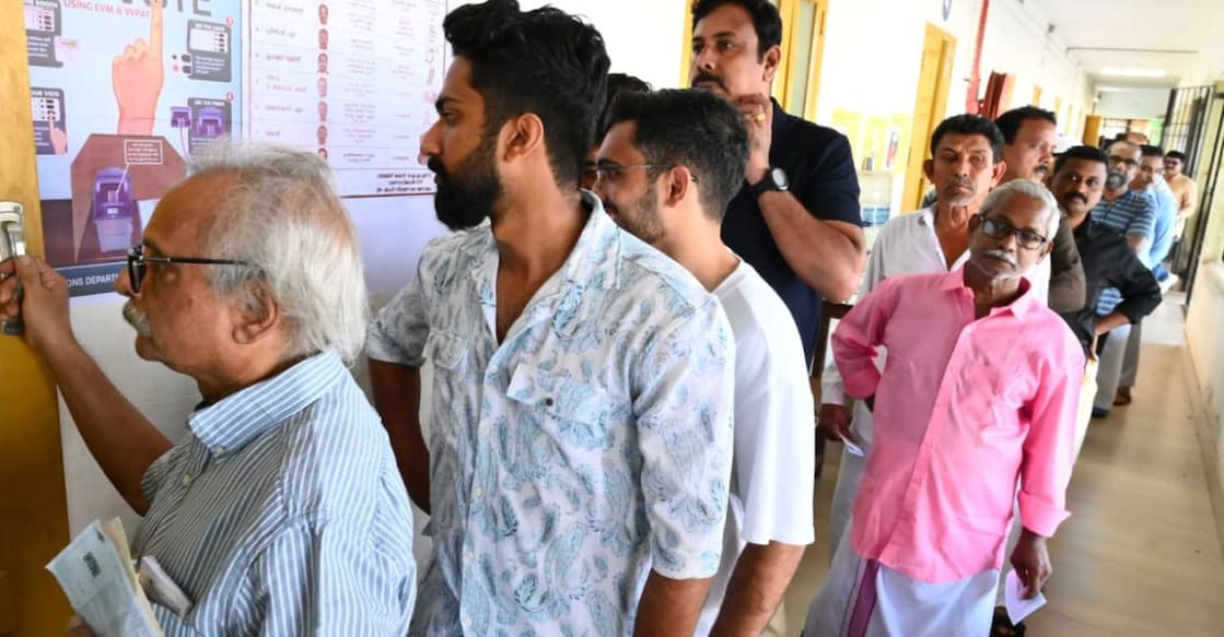 People standing in a queue to cast their votes. Photo: Special Arrangement