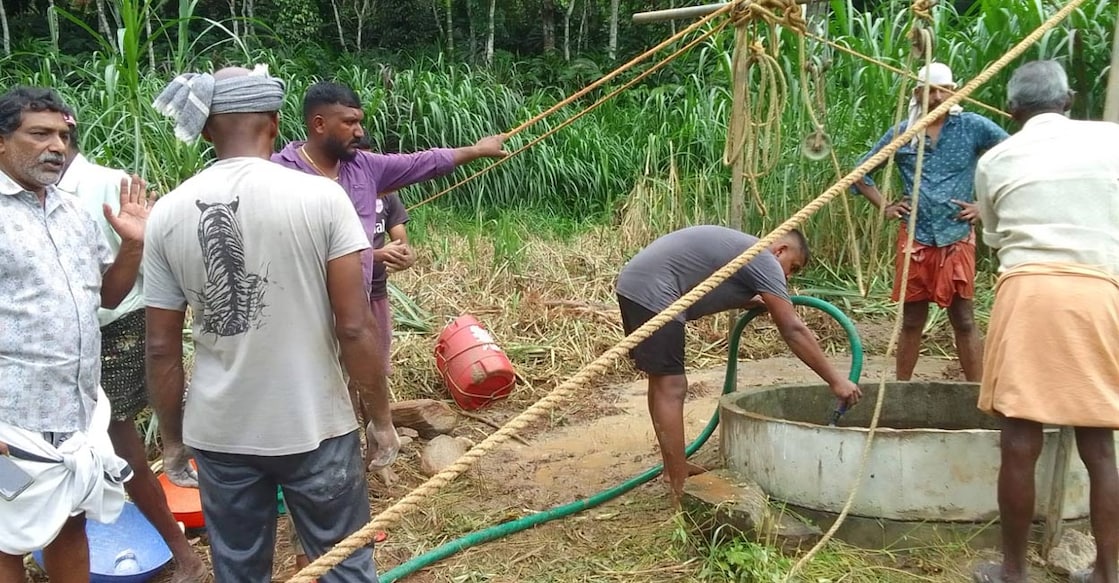 Officials and local people near the well. Photo: Special Arrangement.