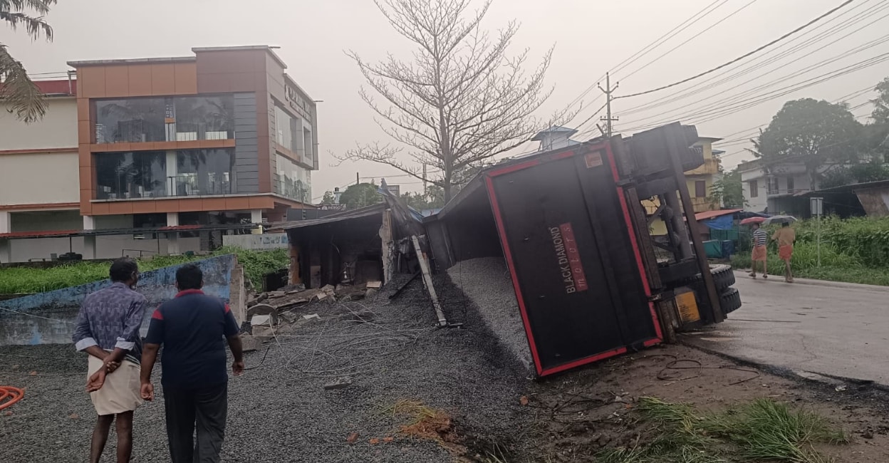 Meenu Article Images - adoor-accident-new The truck that overturned onto Beevi's house. Photo: Special Arrangement.