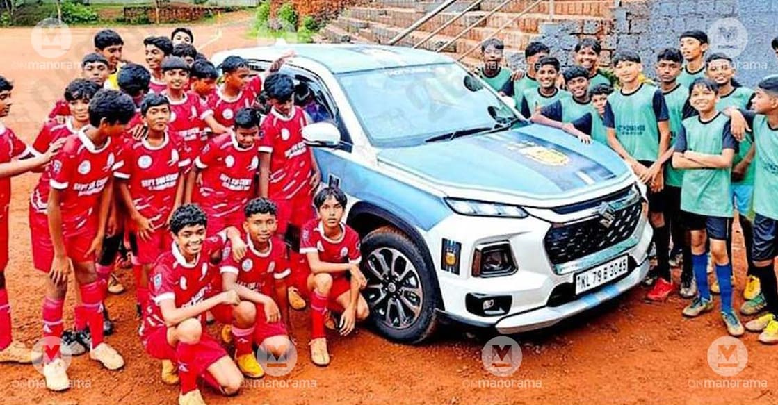 Young football enthusiasts gather around the Argentina-themed car of Saji Lal from Thottuvayal, Chittarikkal, at St Thomas Higher Secondary School, Thomapuram. Photo: Special arrangement