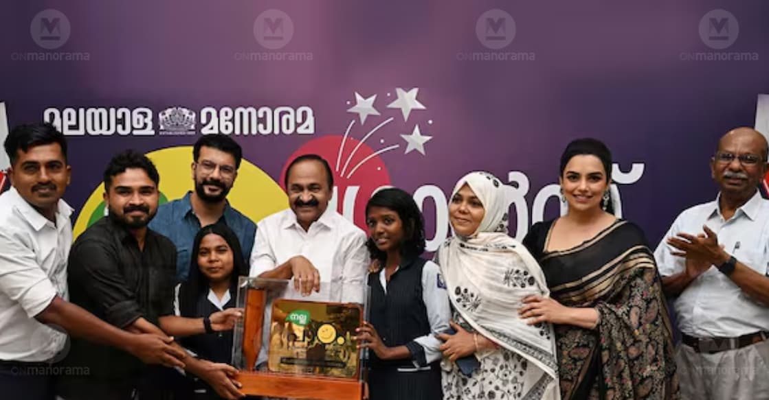 K K Absha and U Arlet Divindas, student representatives of EMEA Higher Secondary School, Kondotty, along with Nalla Paadam coordinators M Anas and K M Ismail and parent C Sharafunnisa, receive the first prize at the Malayala Manorama Nalla Paadam grand finale held in Kochi from Chief Minister V D Satheesan. MLA Ramesh Pisharody, actor Shwetha Menon, and Malayala Manorama Editorial Director Jose Panachippuram are also seen. Photo: Manorama.