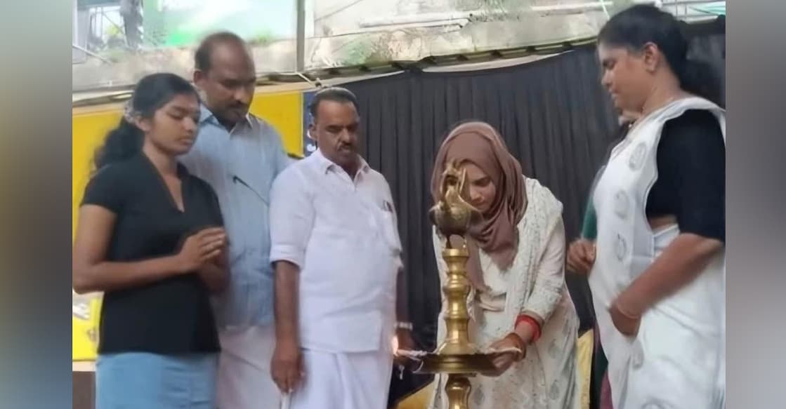 Fathima Thahiliya MLA lighting a traditional lamp at the inaugural function of a restaurant in Perambra. Photo: Special arrangement