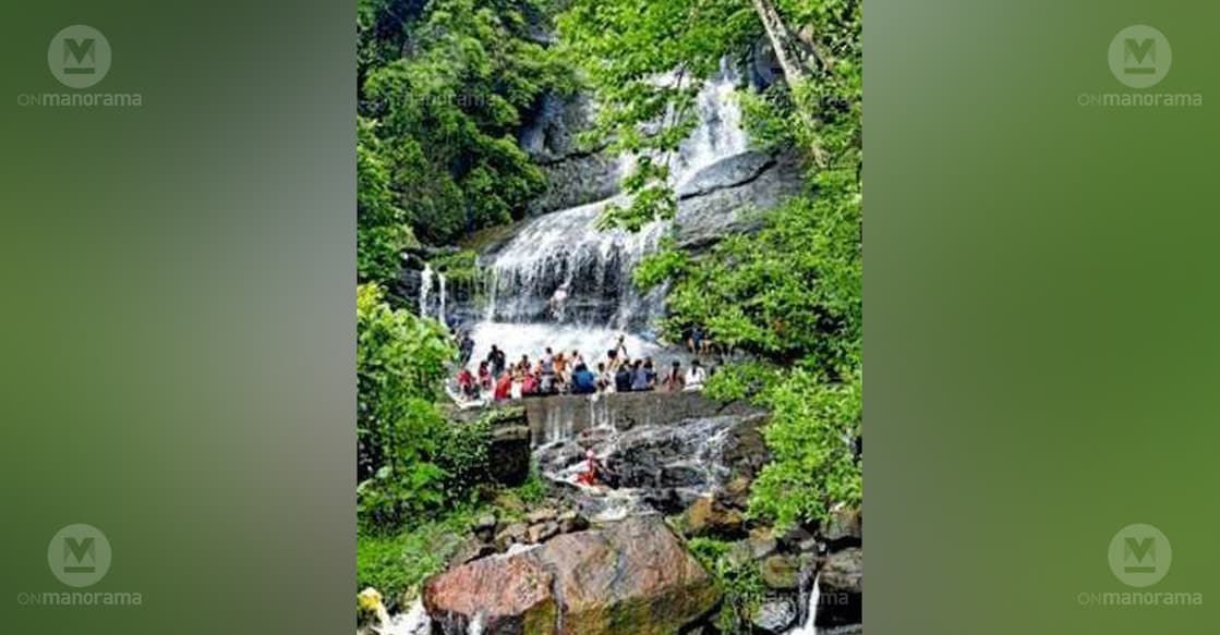 Visitors enjoying the cascading waterfalls at Areekkal in Ernakulam. Photo: Special arrangement