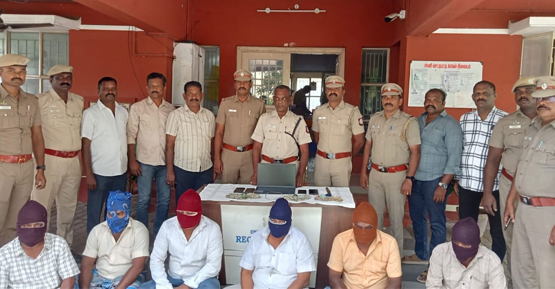 Police personnel, along with the accused individuals. Photo: Special Arrangement
