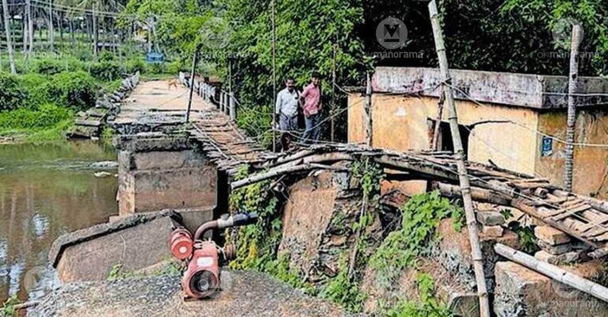 Even eight years after it was washed away in a flood, children in the region continue to reach their schools by walking across the structure using.Agali bridge, Sambarcode school children, damaged bridge, bamboo planks crossing, parents escort, hazardous commute, school reopening, Sholayur panchayat, Agali panchayat, flood damage, unsafe crossing, tribal transport, Gothrasarathi, emergency detour, pedestrian bridge, school children's dangerous journey, Sambarcode community reliance on temporary bridge, flood-damaged infrastructure impacting education, parents' efforts to ensure children's school access, challenges of reaching schools in Agali region, long-term consequences of unrepaired bridges, local governance and infrastructure accountability, safety concerns for students during monsoon, alternative routes and their limitations, impact of natural disasters on community life, education accessibility in remote areas, daily struggles of Sambarcode residents, children's bravery in reaching education, critical need for infrastructure repair in Agali