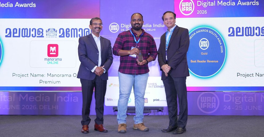Manorama Online Lead Producer Nikhil Scaria Kora receives the Gold Award in the Best Reader Revenue category from WAN-IFRA Chief Operating Officer Thomas Jacob and WAN-IFRA South Asia Director Makhdoom Mohamed.