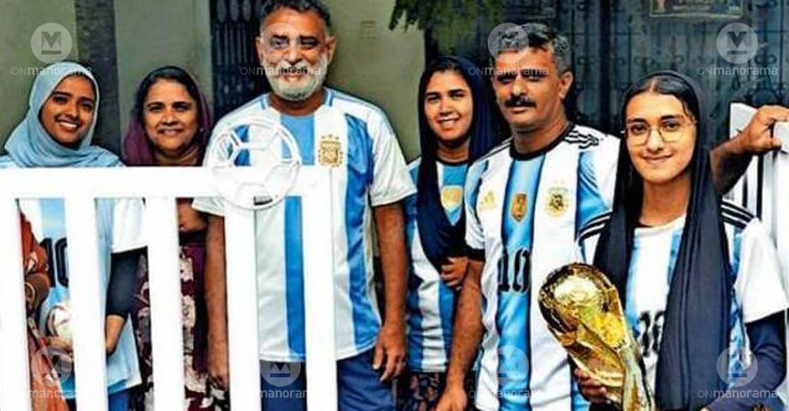 Ummerali and his family in front of their World Cup-themed house. Photo: Special arrangement
