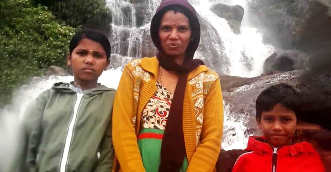 Mari, who was killed in a wild elephant attack, with her children Rakshan and Rakshitha. Photo: Special arrangement