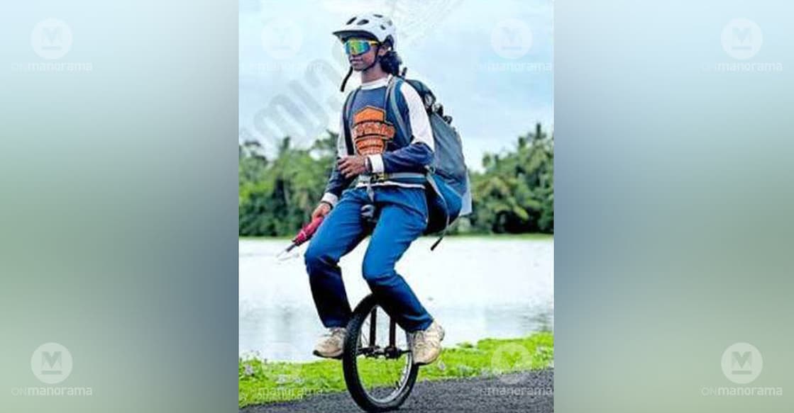 Abi, a native of Parassala, rides through Kuttanad during his journey across Kerala on a single-wheel unicycle. Photo caption: Special arrangement