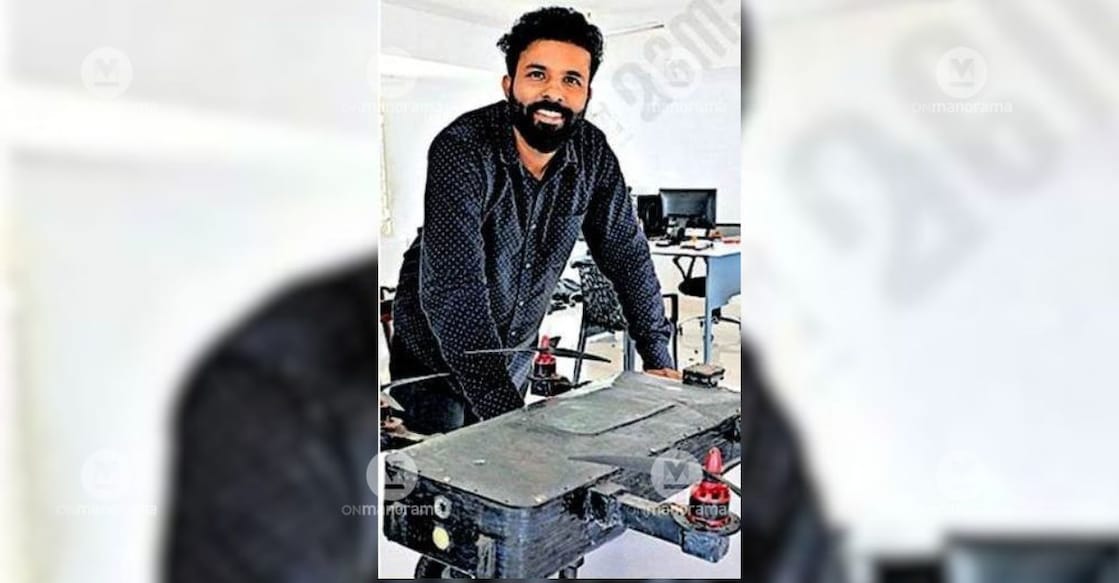 R S Adarsh with the multi-terrain, multi-utility robot developed by him. Photo: Special Arrangement