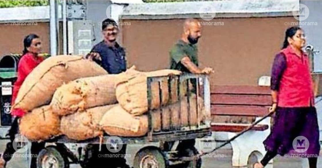 Railway helpers handle consignments at the Thalassery railway station. Photo: Special Arrangement