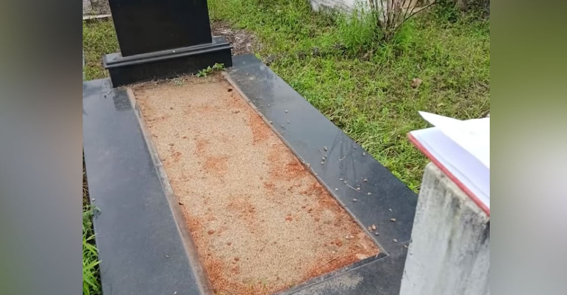 The granite slab was stolen from the top of the tomb. Photo: Screengrab/Manorama News