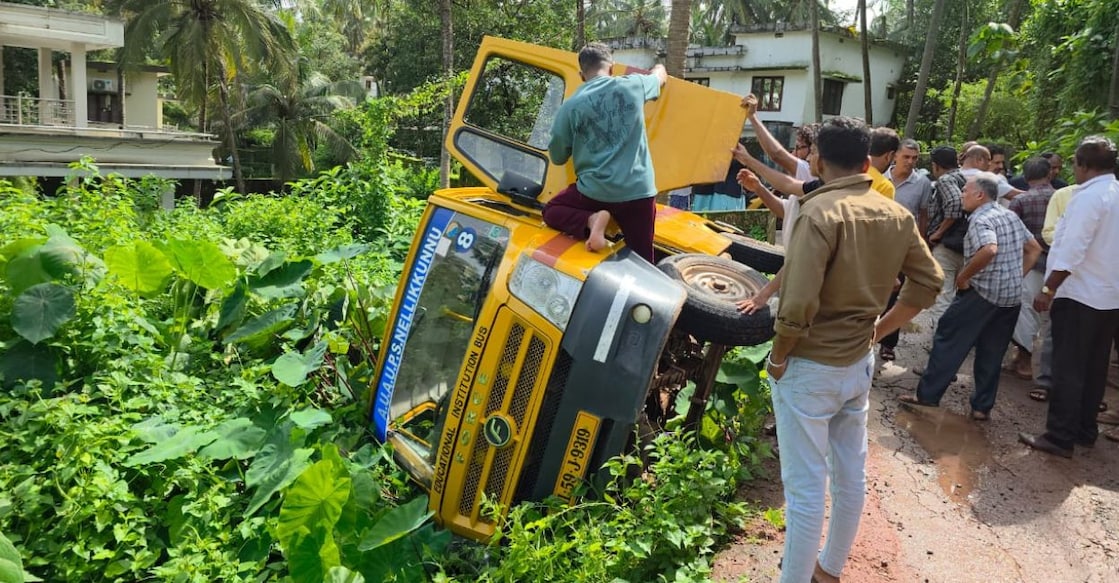 The school bus that overturned into a roadside ditch at Nellikkunnu in Kasaragod town. Photo: Special Arrangement