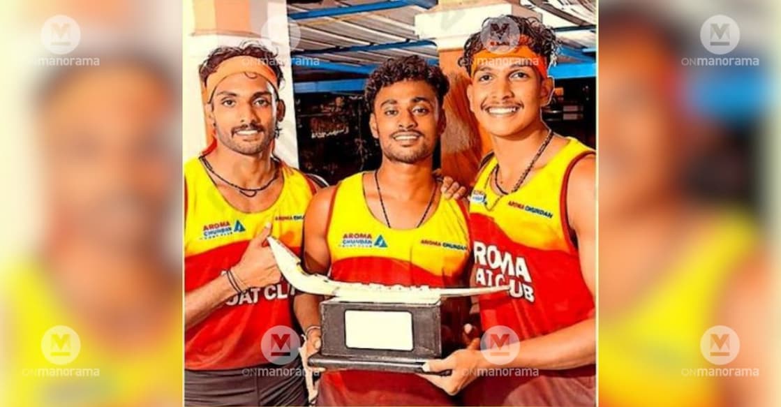 Ashid Raj, Jinu and Athul Raj, rowers of Achamthuruthy Palichon Boat Club who competed for Aroma Boat Club in the Nehru Trophy Boat Race, pose with the coveted silverware. Photo: Special Arrangement.