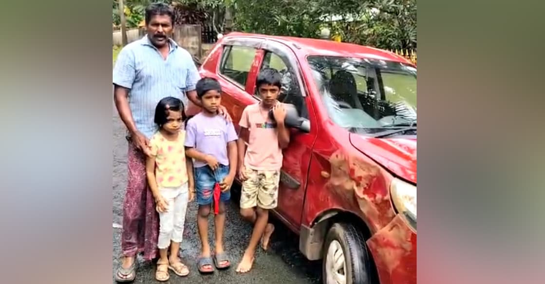 Baby KC and his grandchildren, along with the car damaged by the elephant. Photo: Special arrangement