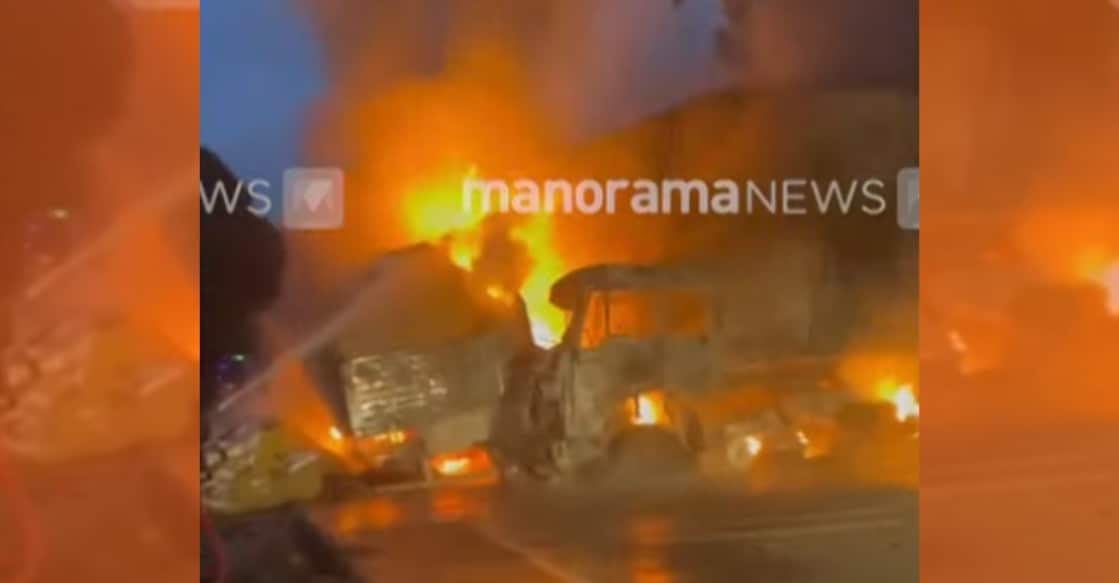 A screengrab showing the trucks on fire following the collision. Photo: Manorama News