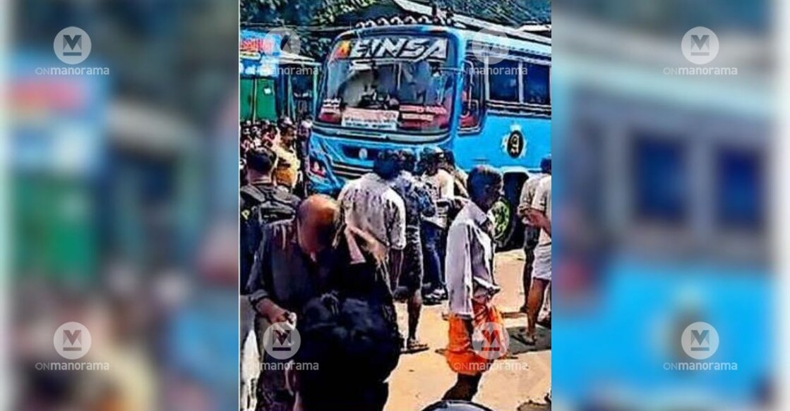 The private bus parked in the middle of the road at Pattayam Kavala following a dispute over trip timings. Photo: Special Arrangement.