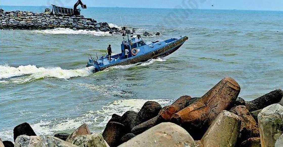 A police boat is heading out for the search for Shijin, who went missing after a boat capsized at the Muthalapozhi estuary in Anchuthengu. Photo: Manorama.
