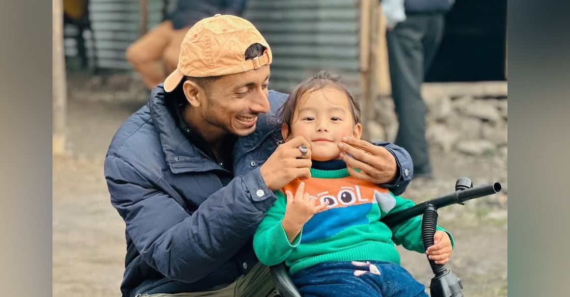 Althaf TA with a kid. Photo: Special arrangement