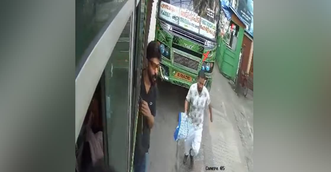 A screengrab showing the man running to avoid being hit by the bus. Photo: Special arrangement