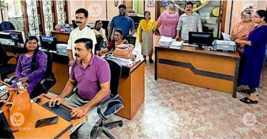 Thalavady Panchayat and Revenue employees working diligently on holidays to ensure financial aid reaches flood victims. Photo: Special Arrangement.