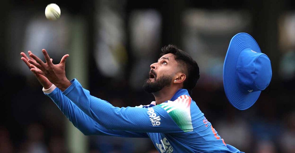 Shreyas Iyer takes the catch, following which he experienced the fall. Photo: AFP