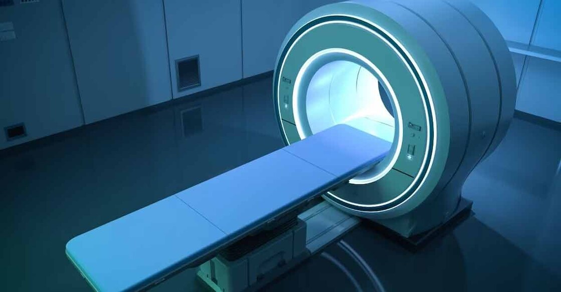 An MRI machine works by using powerful magnets to create a strong magnetic field that aligns protons in the body. Photo: IStock/@grinvalds
