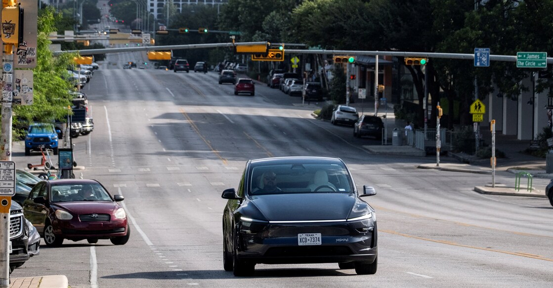 A Tesla robotaxi drives on the street along South Congress Avenue in Austin, Texas. Photo: REUTERS/Joel Angel Juarez