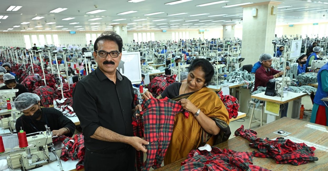 Kitex Group MD Sabu M Jacob and Andhra Pradesh's Minister for Handlooms and Textiles, S Savitha, during her visit to Kitex Garments’ headquarters in Kizhakkambalam. Photo: Special Arrangement