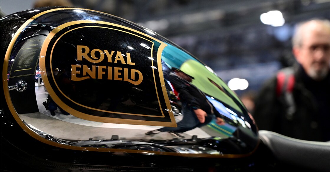 A visitor looks at the Royal Enfield Classic 350 on display. Photo: AFP
