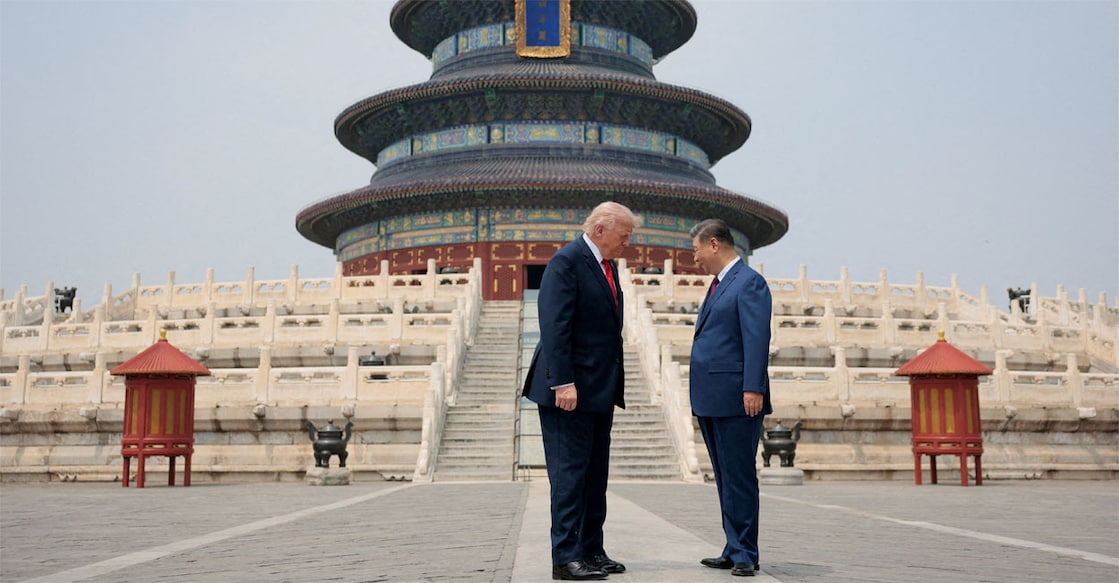 President Trump and Chinese President Xi Jinping stand together as they tour the Temple of Heaven in Beijing, May 14. Photo: REUTERS/Evan Vucci