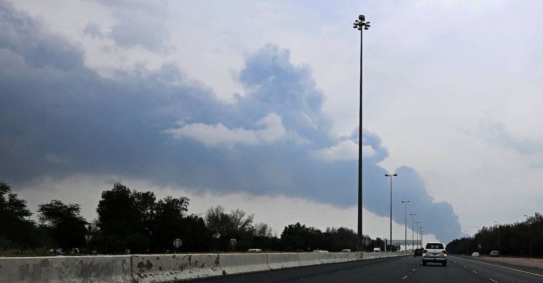 Smoke rises from the area of the Kuwait International Airport after a reported drone strike hit a fuel depot. Photo: AFP