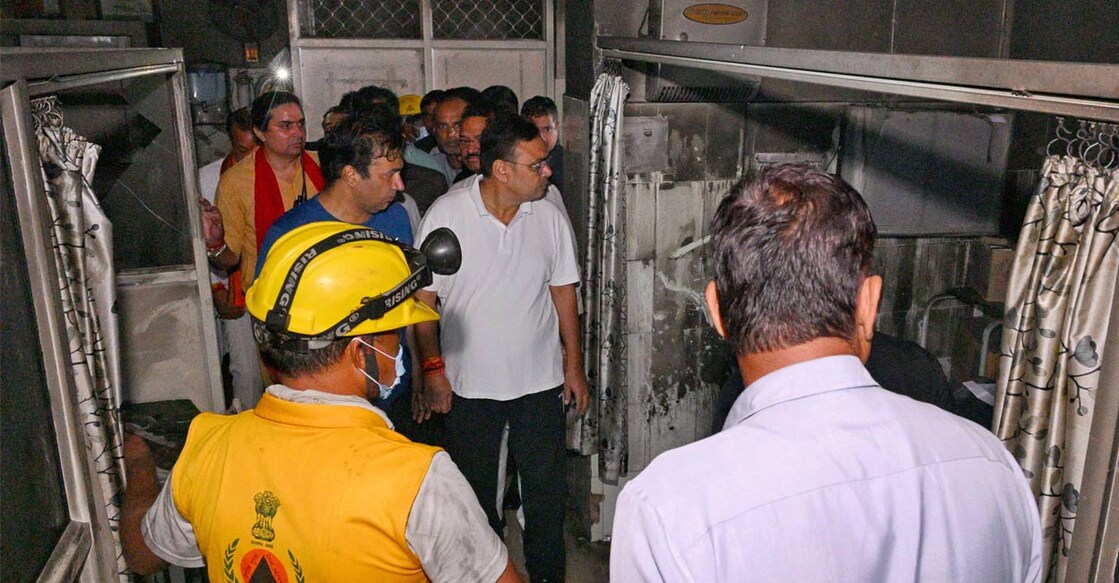 Rajasthan CM Bhajanlal Sharma visits the trauma centre of the state-run Sawai Man Singh (SMS) Hospital, where a fire broke out late Sunday night, in Jaipur. Photo: PTI. 